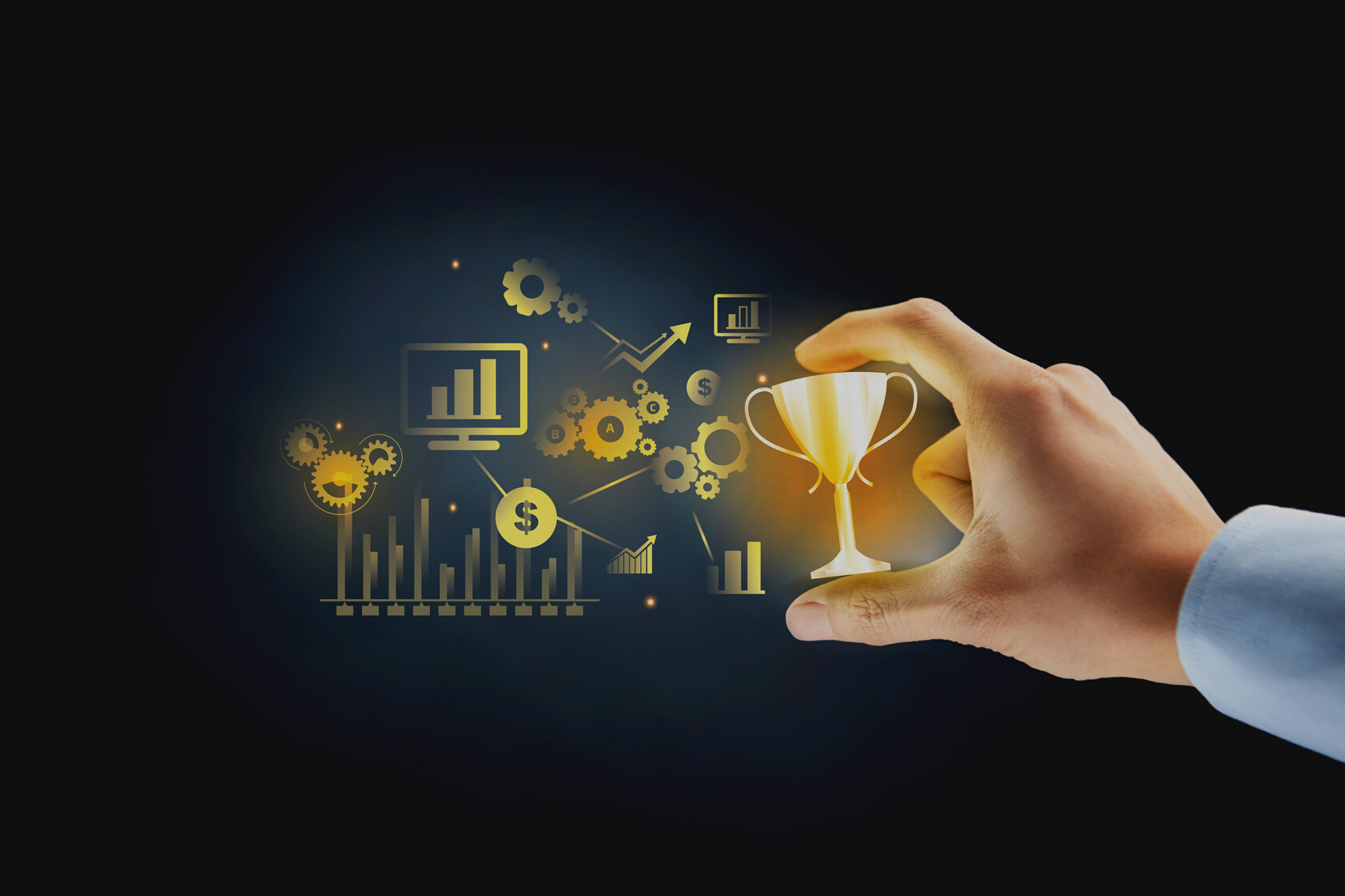 Hand holding trophy with business concept
